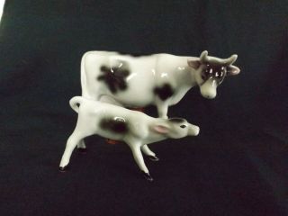 Vintage Black & White Cow And Calf Salt & Pepper Shakers.  Unique.  Made In Japan.