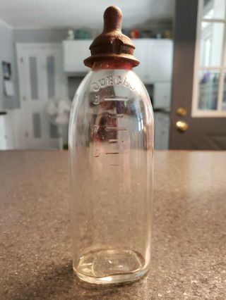Antique Baby Bottle - Embossed On 8 Oz Clear Glass -