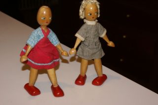 2 Vintage Wooden Peg Dolls Traditional Dress Poland 7.  5 " Tall