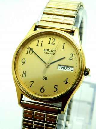 Vintage Seiko Quartz Mens Wrist Watch Gold Toned Water Resistant Model 8223 - 7109