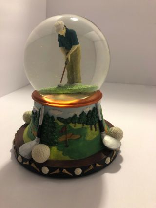 San Francisco Music Box Co.  Snow Globe With Music Golfer On Golf Course Putting