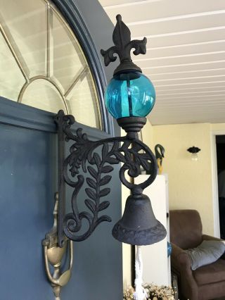 Cast Iron Fleur De Lis Bell With Blue Glass Bulb