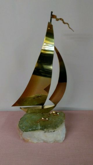 Unique Signed Demott Brass & Onyx Sailboat Sculpture Waves & Dolphins