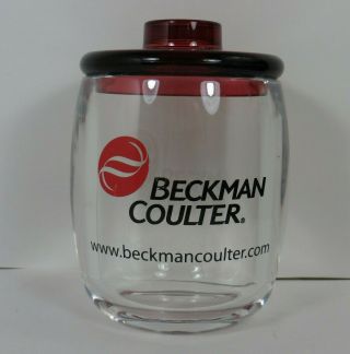 Red And Clear Jar With Beckman Coulter Logo