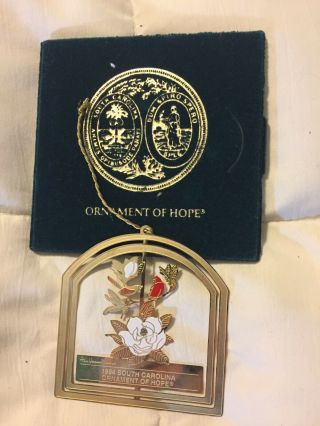 1994 South Carolina Ornament Of Hope Gold Metal Christmas Ornament