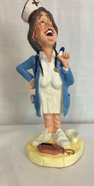 " Feeling No Pain.  " Doug Harris Nurse Figurine With Pill & Bedpan 13185