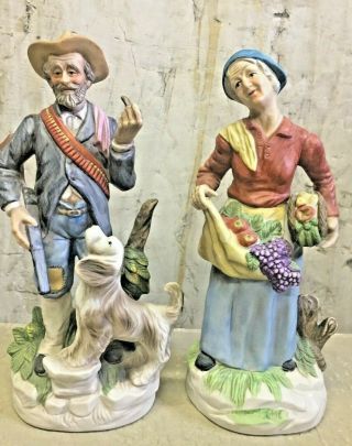 Vintage 11.  5 " Ceramic Figurines - Man With Gun,  Dog & Pipe And Woman With Fruit