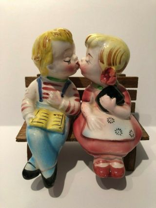 Vintage Salt And Pepper Shakers Kissing Kids On A Bench