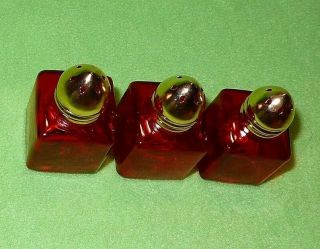Set of 3 vintage RED GLASS salt & pepper shakers with BRASS tops.  Taiwan R O C. 2