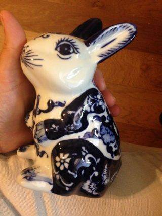 SET OF THREE BLUE AND WHITE HAND PAINTED CERAMIC BUNNY RABBITS AND 2