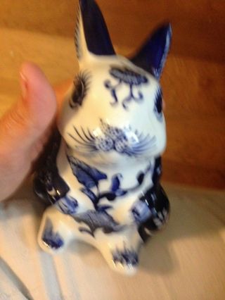 SET OF THREE BLUE AND WHITE HAND PAINTED CERAMIC BUNNY RABBITS AND 3
