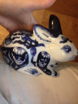 SET OF THREE BLUE AND WHITE HAND PAINTED CERAMIC BUNNY RABBITS AND 7