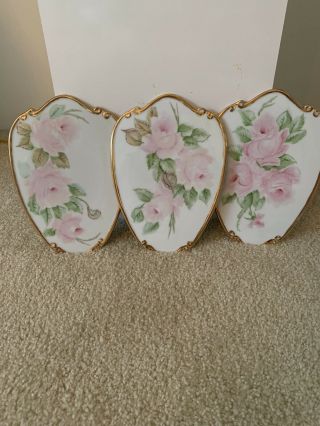 Vintage Porcelain Wall Hanging Plaques With Painted Pink Roses And Gold Trim.