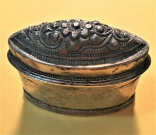Oval Two Piece Thai Metal Box With Decorated Top And Thai Inscriptions On Bottom