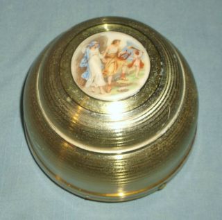 Vintage Brass Colored Aluminum Musical Powder Box Bible Times Scene