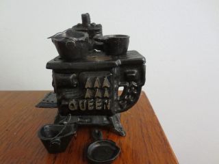 Vintage Cast Iron Miniature Queen Stove And Pots