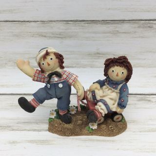 Enesco Raggedy Ann & Andy Bumpy Roads Are Easier When We Are Happy Figurine