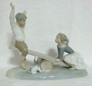 Nao By Lladro Boy & Girl On Seesaw Porcelain Figurine