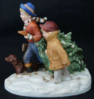 1984 Norman Rockwell " Bringing Home The Christmas Tree " Ceramic Figurine A5843