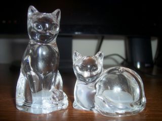 A Set Of Clear Glass Cat Salt And Pepper Shakers