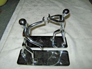 A Mid Century Modern Chrome Metal Mannequin Figural Bookends 5