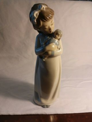 Nao By Lladro Porcelain Girl With Doll 91/2 " Tall
