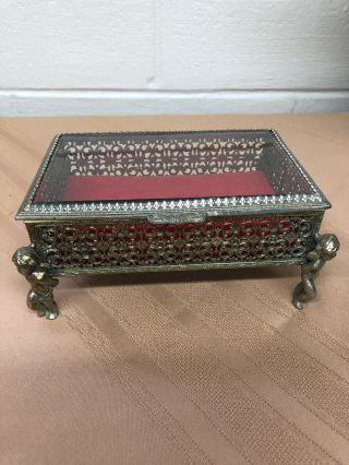 Vintage Brass Jewelry Box With Cherub Legs,  Glass Top And Red Velvet