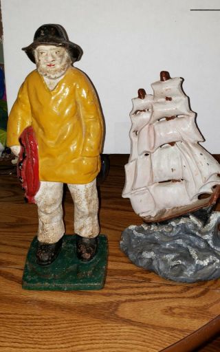 Cast Iron Nautical Old Salt Fisherman And Clipper Ship Doorstops.
