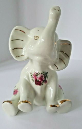 Formalities By Baum Bros.  Porcelain Decorative Floral Elephant Gold Trim