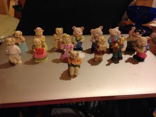 Fourteen (14) J C Miniature Pig Figurines