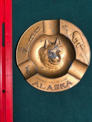 4 - 3/8 " Occupied Japan,  Alaska Souvenir Metal Ashtray,  Bear,  Dog Team,  Wolf,  Worn