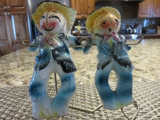 Vintage Scarecrow Salt And Pepper Shakers Hanging On Stand