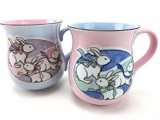 2 Easter Rabbits Mugs Cups Bunny Bunnies Coffee Tea Pink Blue Stoneware