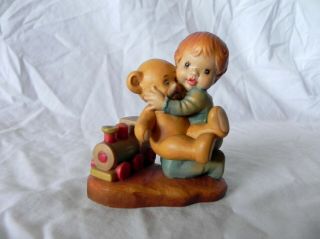 Anri Design Valentine 704/4000 Little Boy With Teddy Bear & Train Figurine