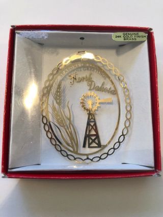 Nation’s Treasures North Dakota Seasons Greetings 24k Gold Finish Brass Ornament