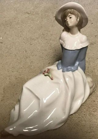 Diana Porcelain Figurine,  Hand Made In Spain,  Lounging Girl Wearing Bonnet