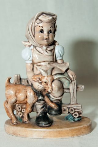 Vtg.  Girl Sitting On A Fence Hugging Goat Ceramic Figurine Signed Laverne 1984