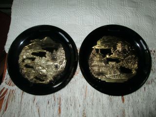 Vintage Pair 7.  75 " Round Black Metal Plates W Gold - Tone 3d Oriental Sculptures