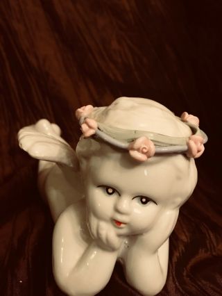 Vintage White Cherub Angel Figurine Porcelain 7  1/4 Long/ 4  Tall.