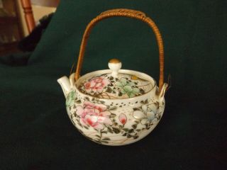 Vintage Small Delicate Porcelain Teapot With Gold Accents.  Woven Handle.