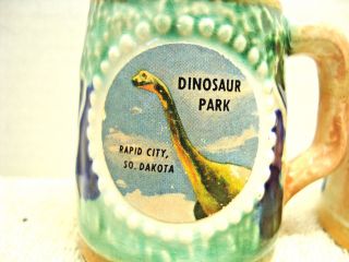 Souvenir,  Dinosaur park,  rapid city,  so.  Dakota salt & pepper shaker set. 2