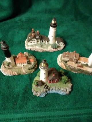 Pre - Owned,  Set Of 4 Lighthouse / Keeper’s Cottages Figurines.