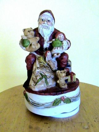 Santa Claus With Teddy Bears And A Doll Wind Up Music Box.  Plays " Silent Night "