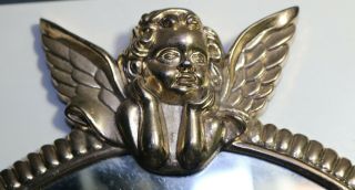 A Gazing Cherub with Wings on TOP of Round Brass Mirror 2