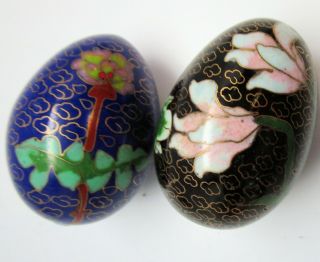 Two Cloisonne Eggs,  Black With Lilies,  Blue With Flowers
