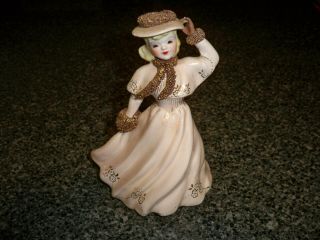 Vintage Florence Ceramics Figurine Of A Lady Trimmed In Gold.