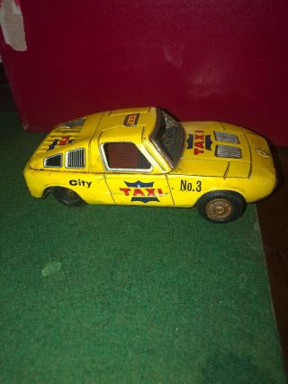 Yone No.  15 Yellow Taxi Cab 6 " Tin Litho Friction Vintage Toy Car Japan Vintage