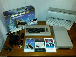 Vintage Commodore 64 Personal Computer With Boxes