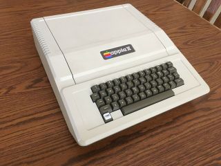 Early Apple II computer,  low serial number (not plus),  disk drives and cards 2