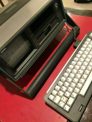 Commodore SX - 64 Vintage Computer with keyboard,  cables,  and floppy disks 3